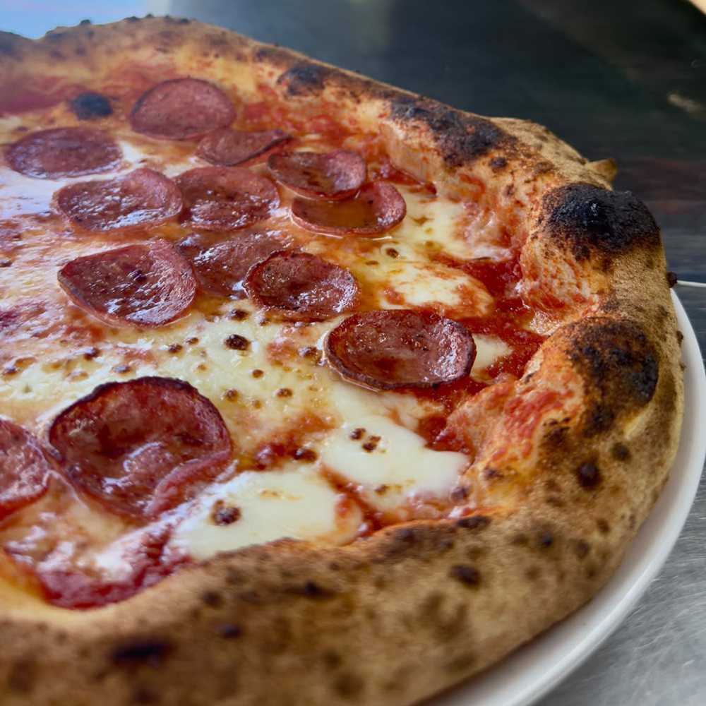 Pepperoni pizza fresh from the wood oven