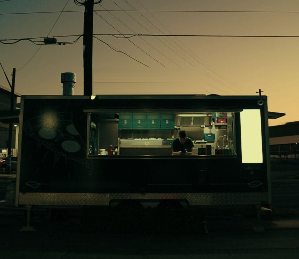 The PizzAmò food truck at dusk on Parramatta Road